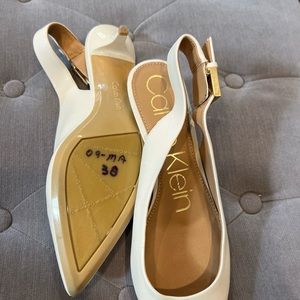 Calvin Klein creamish white sling backs
